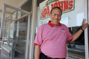 Don Snider, Papa John's local franchisee, stands outside of Papa John's new location on Washtenaw in Ypsilanti.